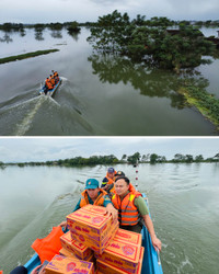 Vượt biển nước mang nhu yếu phẩm cho đồng bào vùng ngập lụt Chương Mỹ