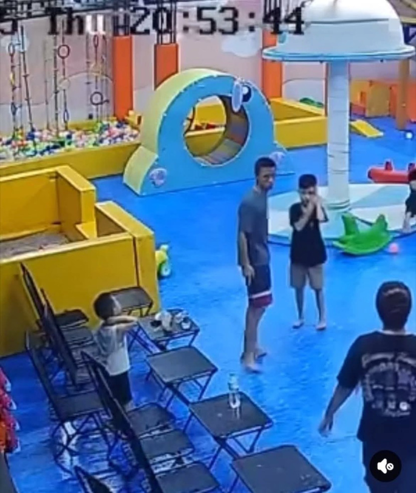 Hình ảnh người đàn ông đánh trẻ trong clip