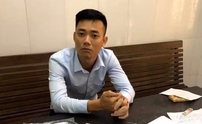 Đối tượng Trần Anh Tuấn tại cơ quan công an