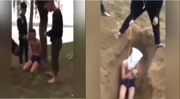Hình ảnh nam thanh niên bị đánh đập, đẩy xuống hố đòi "chôn sống" (ảnh cắt từ clip) Hình ảnh nam thanh niên bị đánh đập, đẩy xuống hố đòi "chôn sống" (ảnh cắt từ clip)