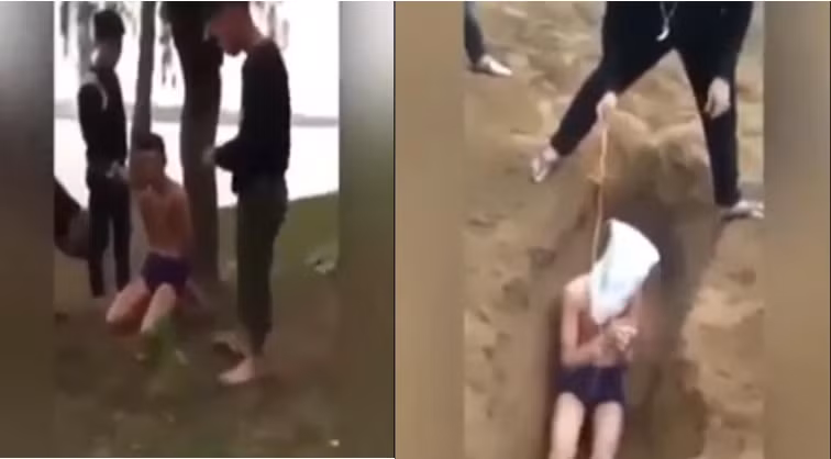 Hình ảnh nam thanh niên bị đánh đập, đẩy xuống hố đòi "chôn sống" (ảnh cắt từ clip) Hình ảnh nam thanh niên bị đánh đập, đẩy xuống hố đòi "chôn sống" (ảnh cắt từ clip)