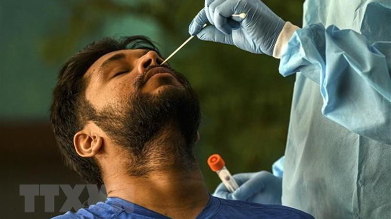 Ấn Độ vượt mốc 21.000 ca mắc Covid-19 trong ngày (Ảnh: AFP/TTXVN)