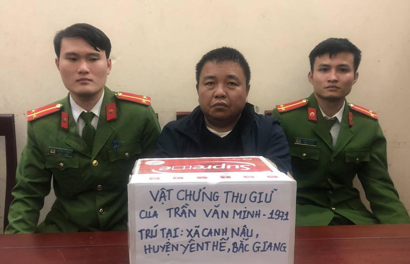 Trần Văn Minh tại cơ quan công an (ảnh công an cung cấp)