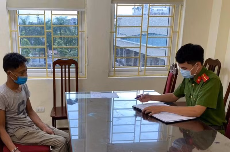 Đối tượng Giang tại cơ quan Công an Đối tượng Giang tại cơ quan Công an