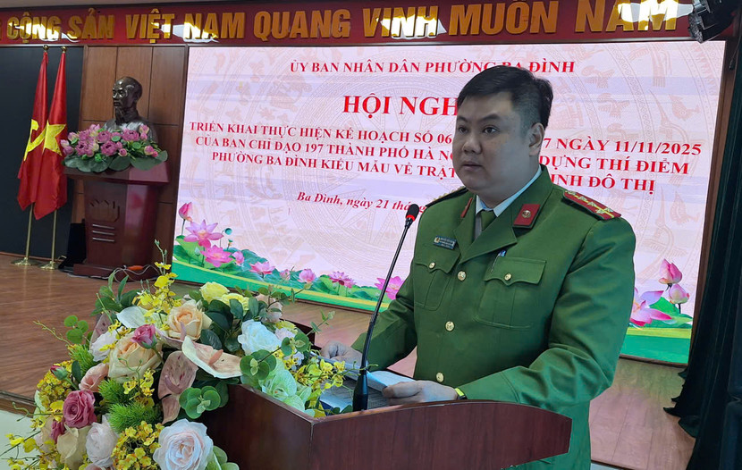 Đại úy Nguyễn Tiến Quang, Phó trưởng Công an phường Ba Đình phát biểu tại hội nghị Đại úy Nguyễn Tiến Quang, Phó trưởng Công an phường Ba Đình phát biểu tại hội nghị