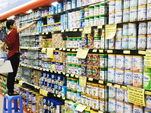 Bộ Tài chính đề nghị doanh nghiệp giảm giá bán sữa ảnh 1