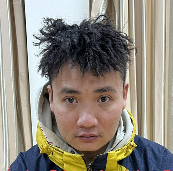 Trương Ngọc Hà Tuấn tại cơ quan công an.