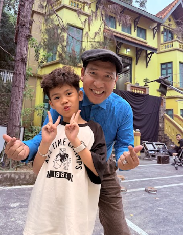 Bé gấu và NSND Quang Thắng