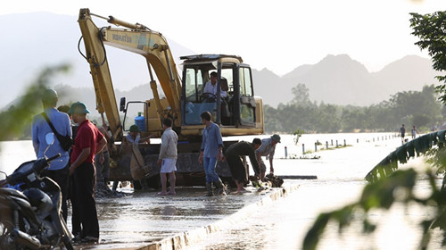 Đã hàn khẩu đê bao hữu Bùi, mực nước đang rút dần ảnh 1 Đã hàn khẩu đê bao hữu Bùi, mực nước đang rút dần ảnh 1