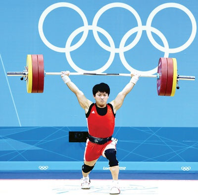 Trần Lê Quốc Toàn bất ngờ được đôn lên nhận huy chương Olympic.