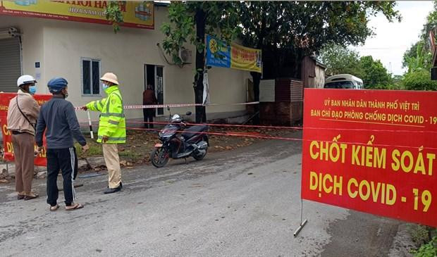 Lực lượng chức năng phong tỏa khu 1 thị trấn Hùng Sơn, huyện Lâm Thao, Phú Thọ (Ảnh TTX VN) Lực lượng chức năng phong tỏa khu 1 thị trấn Hùng Sơn, huyện Lâm Thao, Phú Thọ (Ảnh TTX VN)