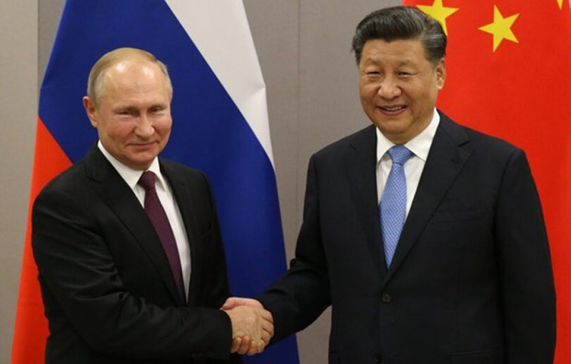 Trong chuyến công du, Chủ tịch Trung Quốc Tập Cận Bình và Tổng thống Nga Vladimir Putin trao đổi việc xây dựng mối quan hệ kiểu mới giữa hai cường quốc này Trong chuyến công du, Chủ tịch Trung Quốc Tập Cận Bình và Tổng thống Nga Vladimir Putin trao đổi việc xây dựng mối quan hệ kiểu mới giữa hai cường quốc này