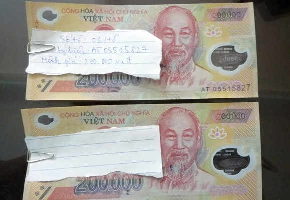 Phát hiện gần 30 triệu đồng tiền giả ảnh 2