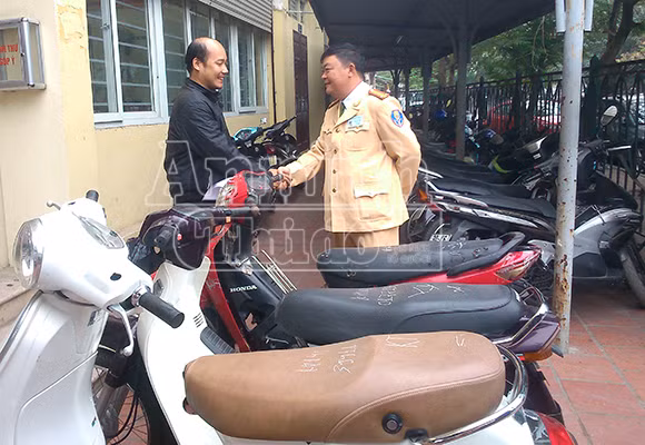 Nhận lại xe máy sau 4 năm bị mất ảnh 1