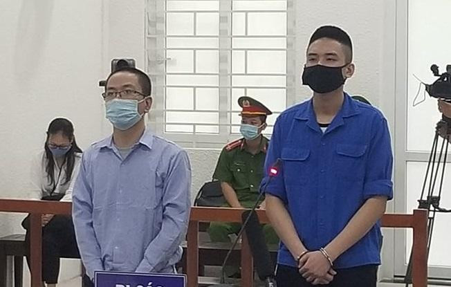 Hai tên cướp ngân hàng bị đưa ra xét xử Hai tên cướp ngân hàng bị đưa ra xét xử