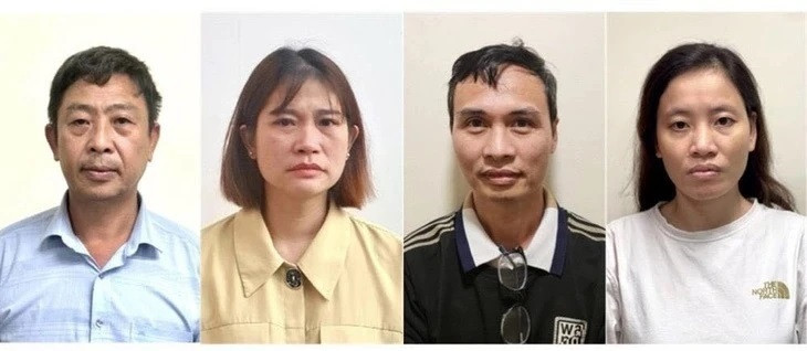 Bị can Lưu Anh Tuấn (thứ 2, bên phải) cùng những bị cáo liên quan