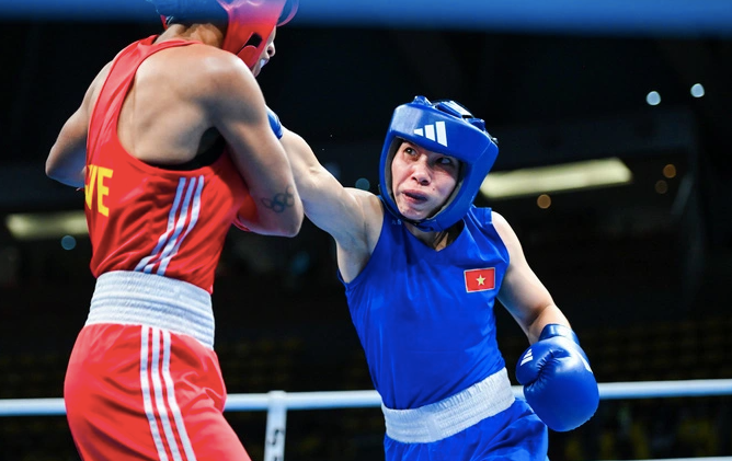 Tối thiểu 1,15 tỉ đồng tiền thưởng cho VĐV vô địch quyền Anh Olympic Paris Trong ảnh: Võ sỹ Hà Thị Linh - một trong 2 đại diện của quyền Anh Việt Nam tại Thế vận hội Tối thiểu 1,15 tỉ đồng tiền thưởng cho VĐV vô địch quyền Anh Olympic Paris Trong ảnh: Võ sỹ Hà Thị Linh - một trong 2 đại diện của quyền Anh Việt Nam tại Thế vận hội