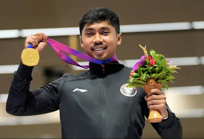 Muhammad Putra gây ấn tượng với "cú đúp vàng", dù bắn súng không nằm trong kế hoạch giành huy chương vàng ASIAD 19 của thể thao Indonesia