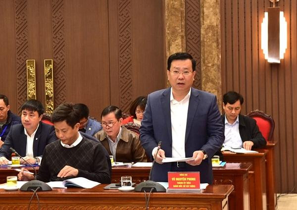 Giám đốc Sở Xây dựng Hà Nội Võ Nguyên Phong báo cáo tại buổi làm việc