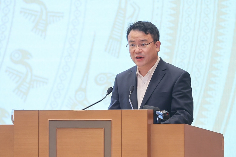 Thứ trưởng Bộ Kế hoạch và Đầu tư Trần Quốc Phương báo cáo tại hội nghị