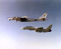 500px-tu-95-escorted-by-an-f-14-6818.jpg