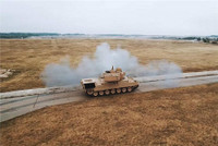 Xe tăng Leopard 1A5 cổ điển sánh ngang T-14 Armata nhờ tháp pháo Cockerill 3105 