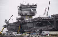 the-navy-aircraft-carrier-uss-enterprise-rests-at-the-pier-news-photo-1700253105-8857-3940.jpg