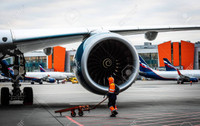 141313814-october-29-moscow-russia-airport-employee-at-the-engine-rolls-royce-trent-xwb-of-a-wide-body.jpg
