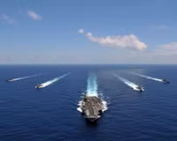 iran-warns-of-total-war-as-us-carrier-strike-group-nears-middle-east.jpg