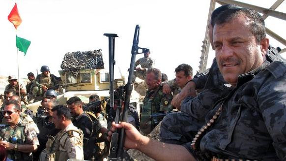 Anh cung cấp súng máy hạng nặng và huấn luyện người Kurd chống IS ảnh 1