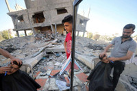 [Ảnh] Cuộc sống thường ngày giữa cảnh đổ nát vì bom đạn ở Gaza