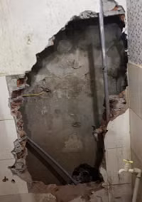 Thót tim giải cứu bé trai mắc kẹt hơn 1 ngày đêm tại khe tường bê tông