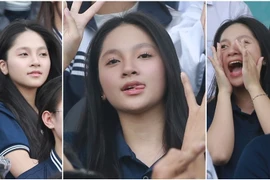 Fan nữ xinh đẹp nổi bật trên khán đài ở vòng 1/8