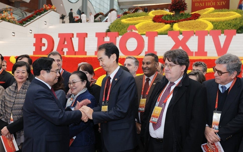thu-tuong-pham-minh-chinh-va-cac-khach-moi-quoc-te-den-tham-du-dai-hoi-lan-thu-xiv-cua-dang-ta.jpg