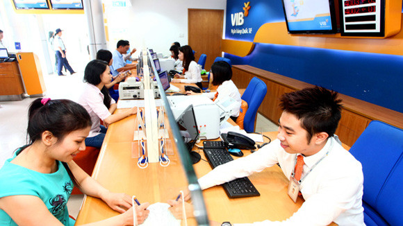 Ngân hàng chấp nhận giảm lãi để xử lý nợ xấu ảnh 1