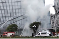 Hình ảnh lực lượng đặc biệt tham gia diễn tập tìm kiếm cứu nạn quy mô lớn tại tổ hợp nhà cao tầng