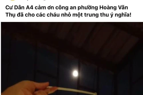 Các chiến sỹ Công an ‘hóa thân’ thành chú Cuội, chú Tễu tặng quà trung thu cho con trẻ sống trong ‘vùng Covid Đền Lừ’