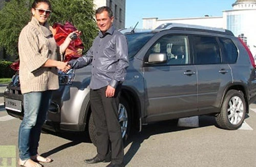 Nhà vô địch Olympic tặng thầy xe hơi