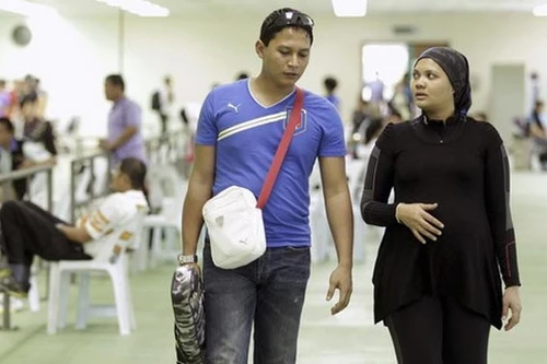 Bụng bầu 8 tháng vẫn đi thi Olympic