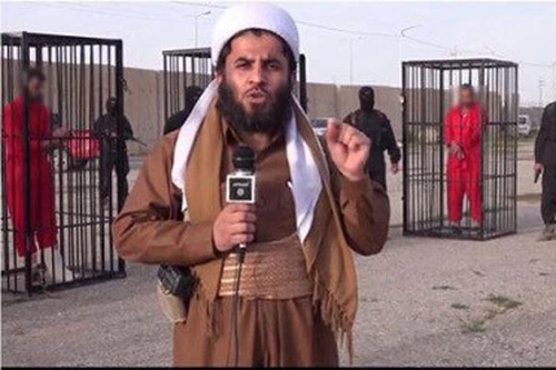 IS nhốt 21 chiến binh trong lồng sắt diễu phố