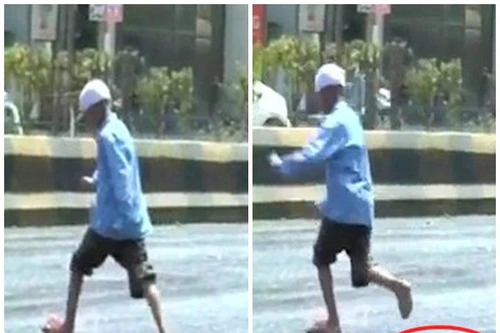 Nắng nóng khiến đường Ấn Độ chảy nhựa, người dân "mất dép" khi đi lại