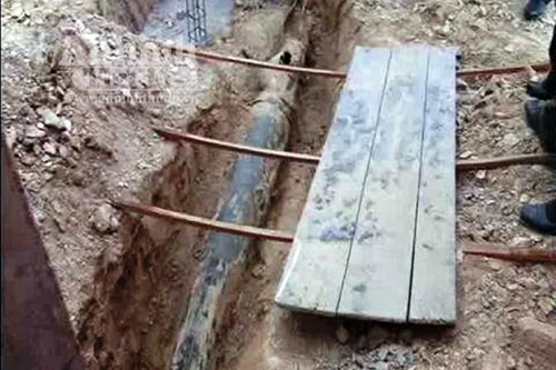 Phát hiện quả bom dài 2,4 m khi đào đất đổ nền nhà