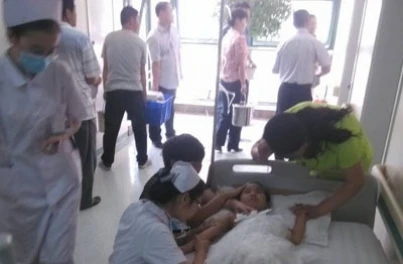 Trung Quốc: Cảnh sát để súng cướp cò khi đang thuyết giảng tại nhà trẻ