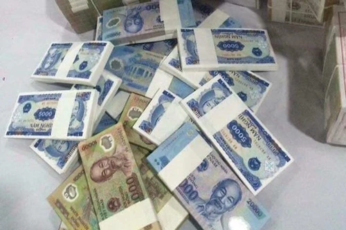 Đổi tiền lẻ, tiền mới dịp Tết: Thận trọng kẻo "tiền mất, tật mang"