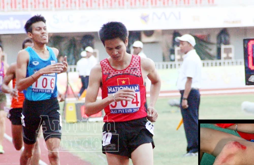 Dương Văn Thái cán đích với đầu gối rớm máu 