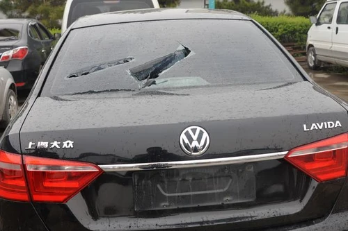 Trung Quốc: Đại biểu HĐND huyện 1 tháng 2 lần đập xe đánh người 