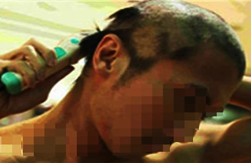 Giang hồ đất Cảng gọt đầu giám đốc thành 3 chỏm