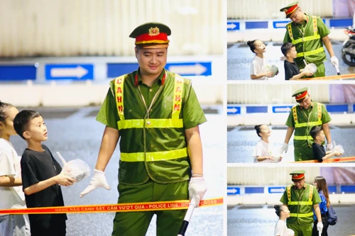 Đáng yêu khoảnh khắc cháu bé lễ phép mời cơm chú Công an làm nhiệm vụ A80