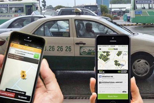 Nhiều hãng taxi dừng "bắt tay" với Grab taxi
