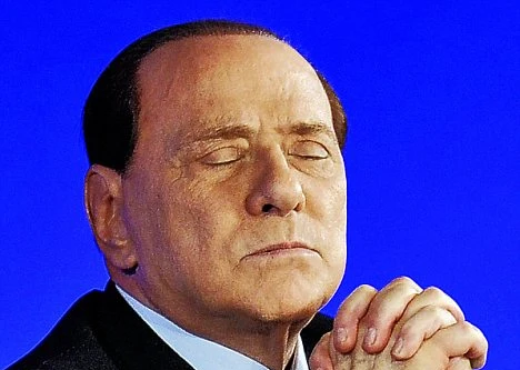 Thủ tướng Ý Silvio Berlusconi... ngủ gật trước các nỗ lực của G20 